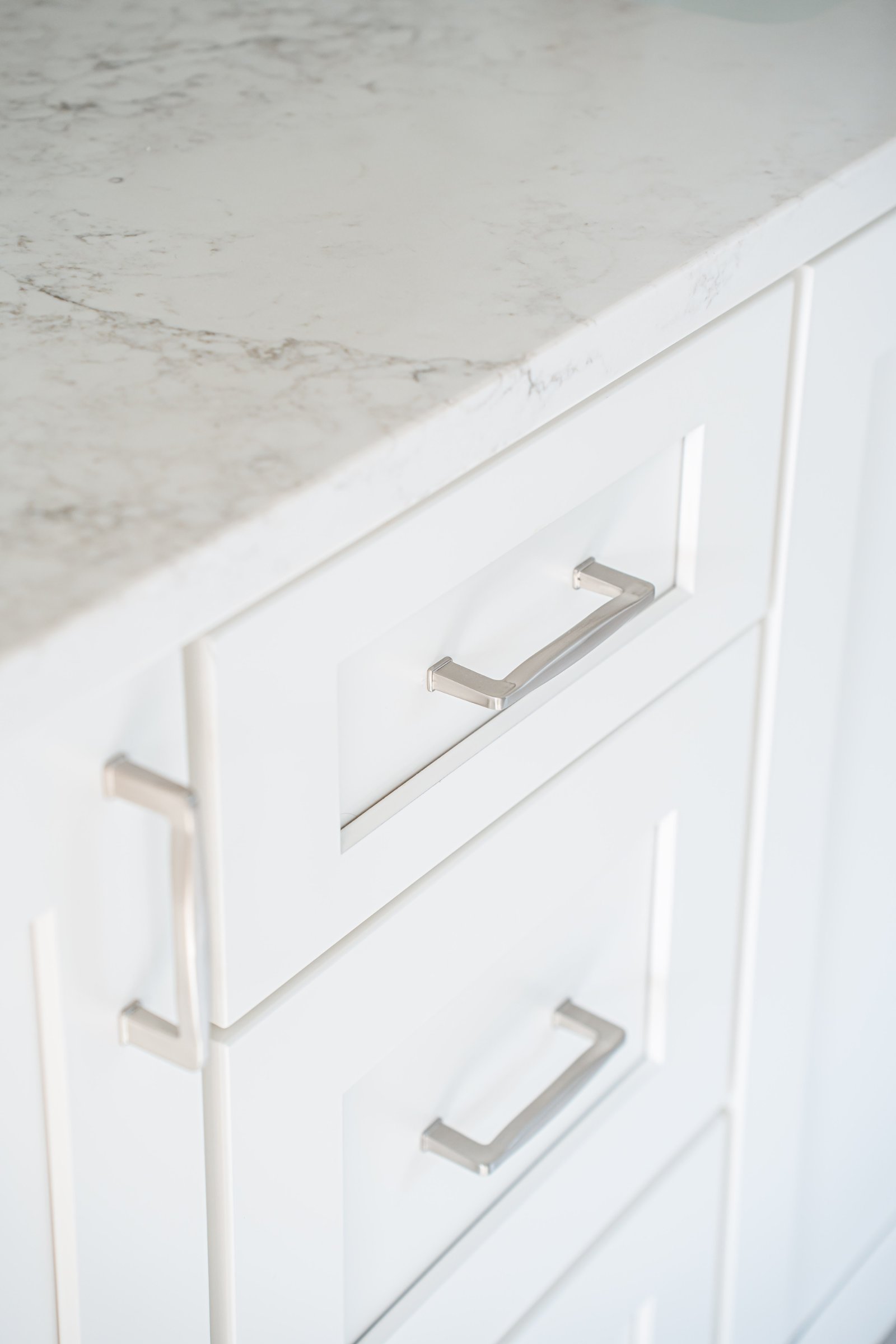 Spa Sanctuary bathroom detail — brushed nickel fixtures and hardware