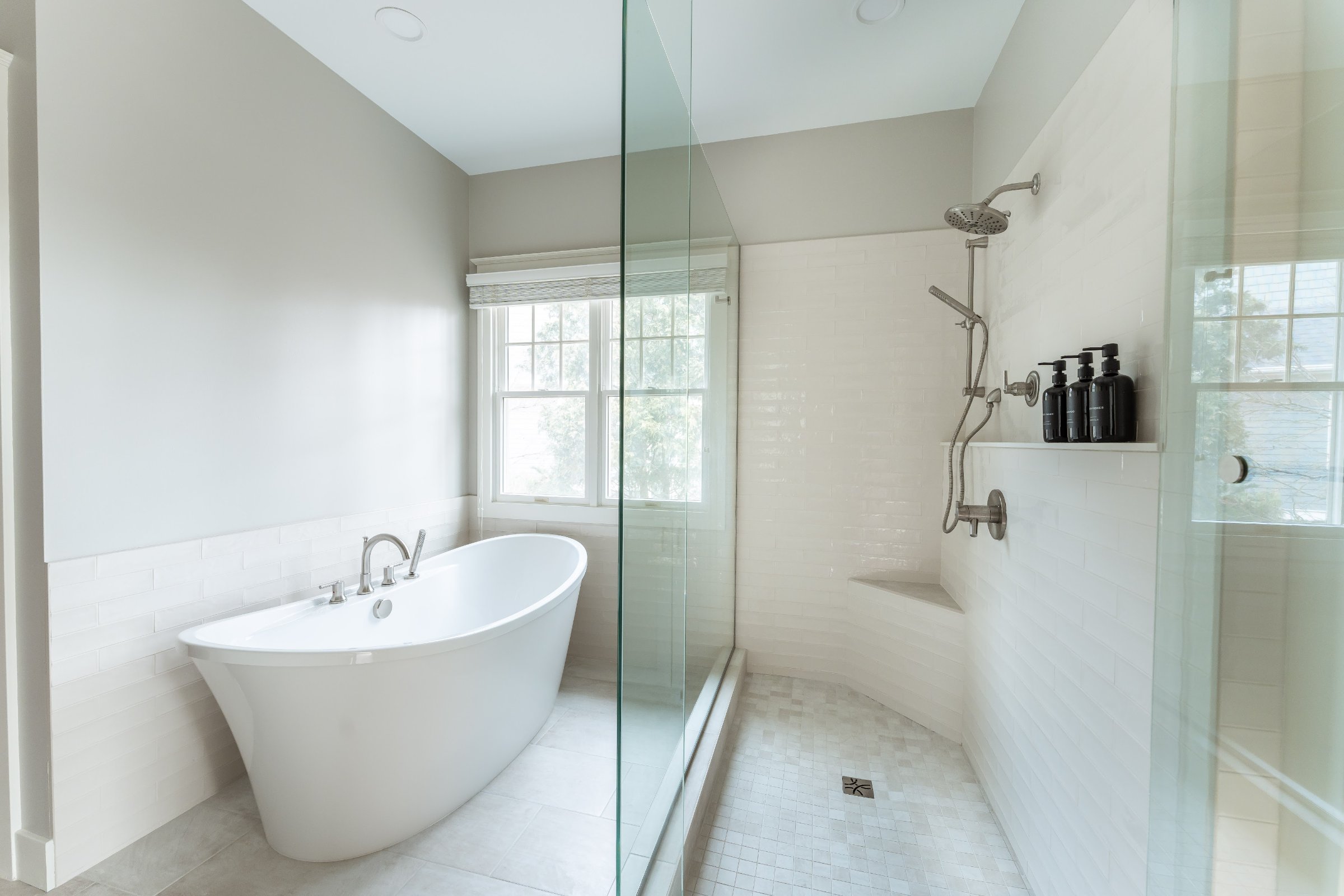 Spa Sanctuary bathroom detail — marble shower tile close-up
