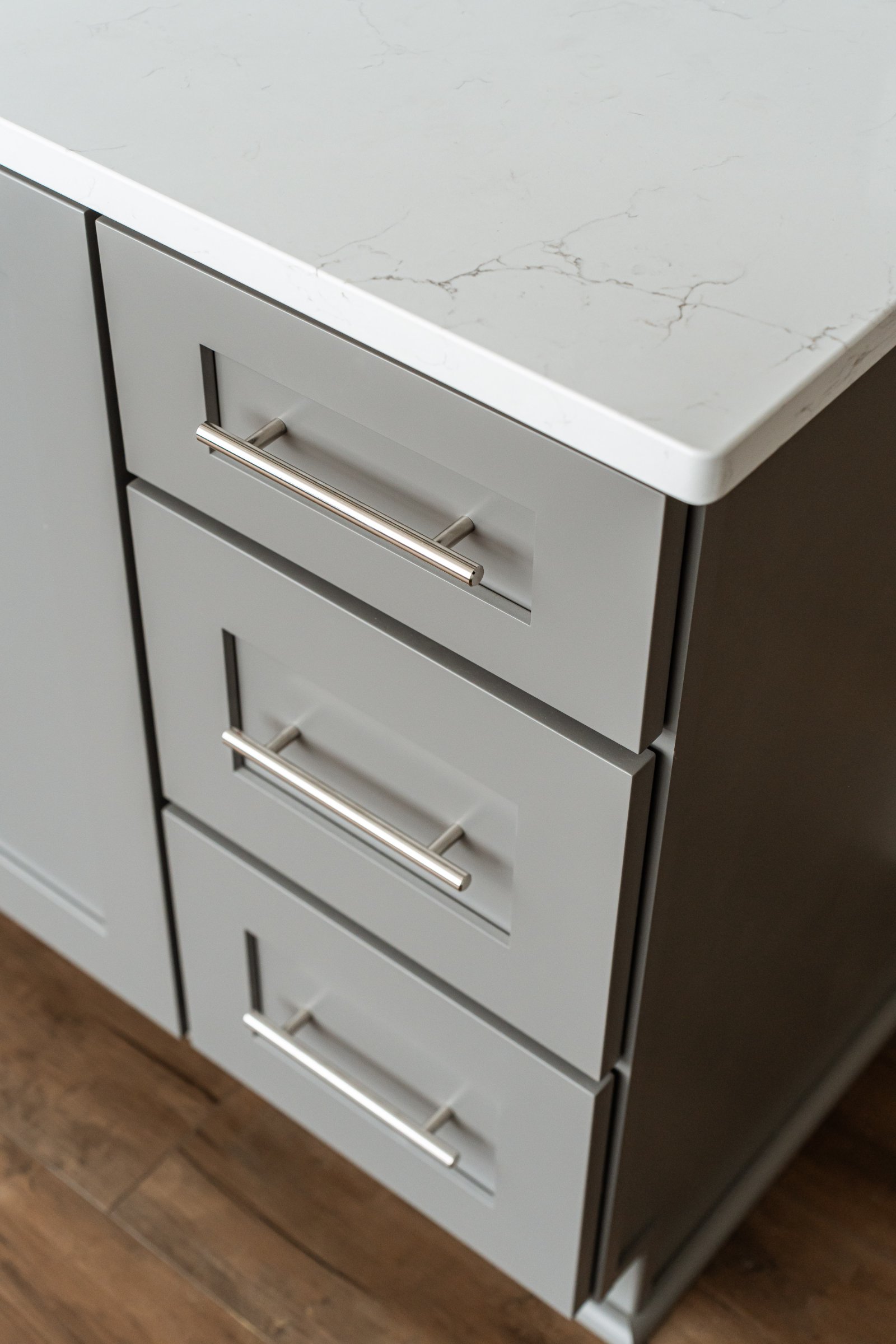 Golf lounge basement overview with luxury vinyl plank flooring and recessed lighting