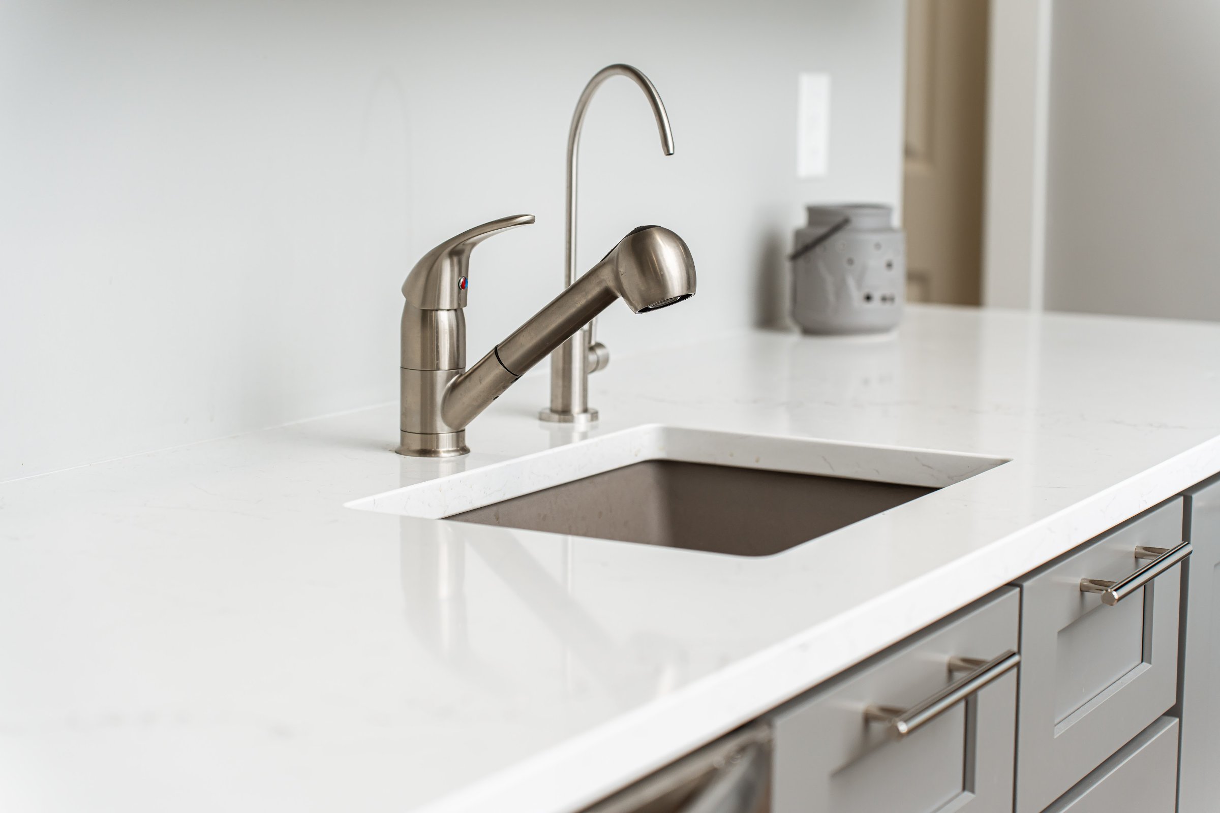 Entertainment basement brushed nickel fixtures and bathroom detail