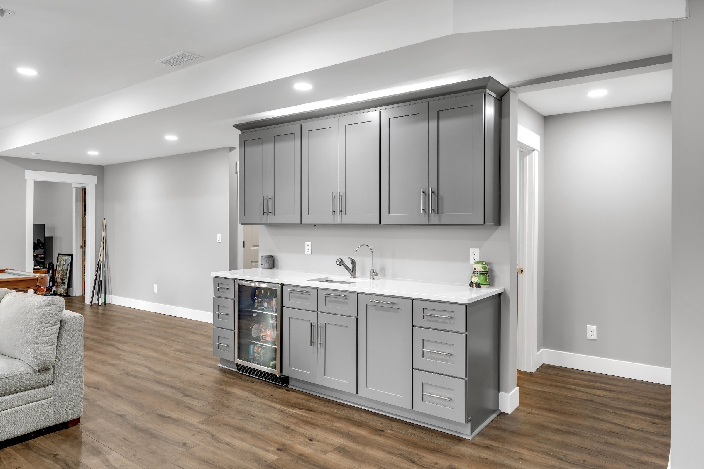 Entertainment basement natural light window solutions and finished walls