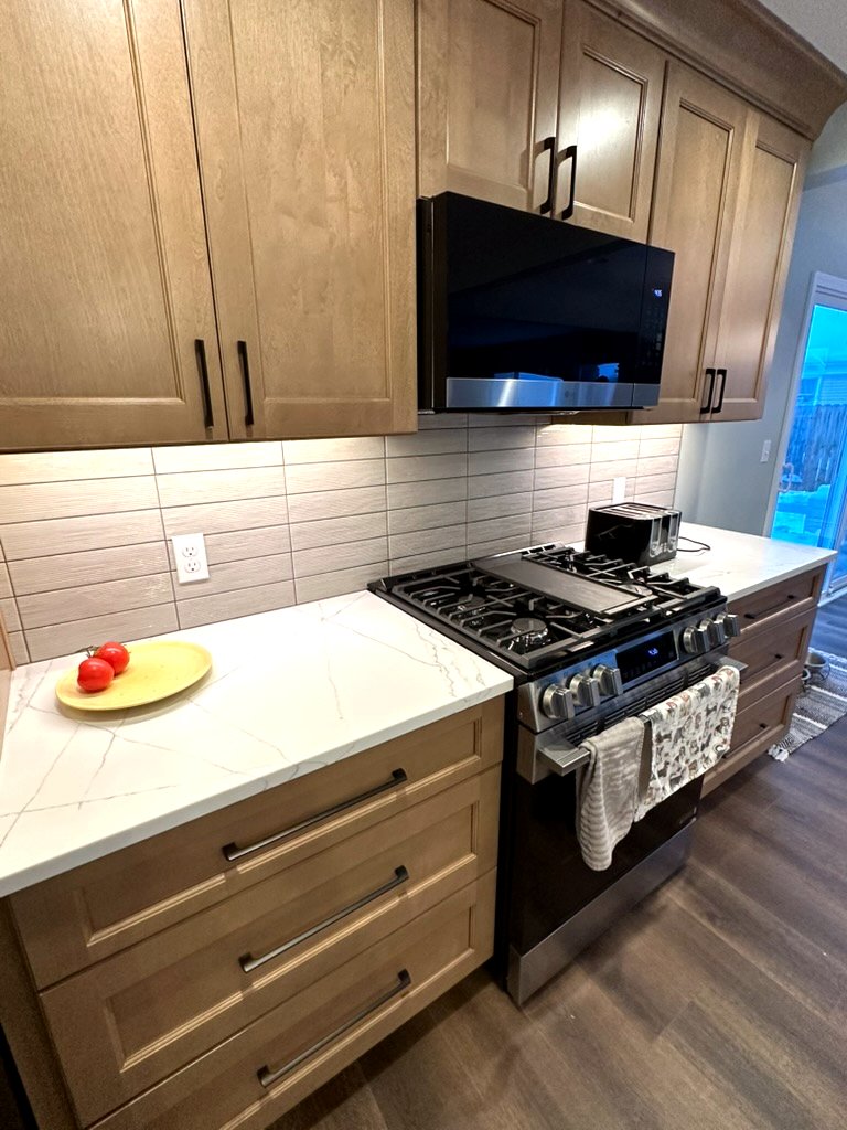 Modern Sophistication bathroom — matte black rainfall showerhead and fixtures