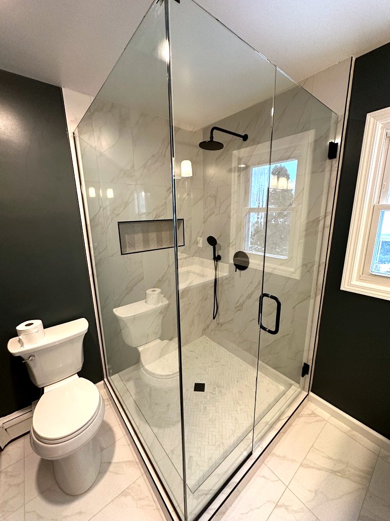 Woodland Escape bathroom — moody blue-green wall color with warm wood tones