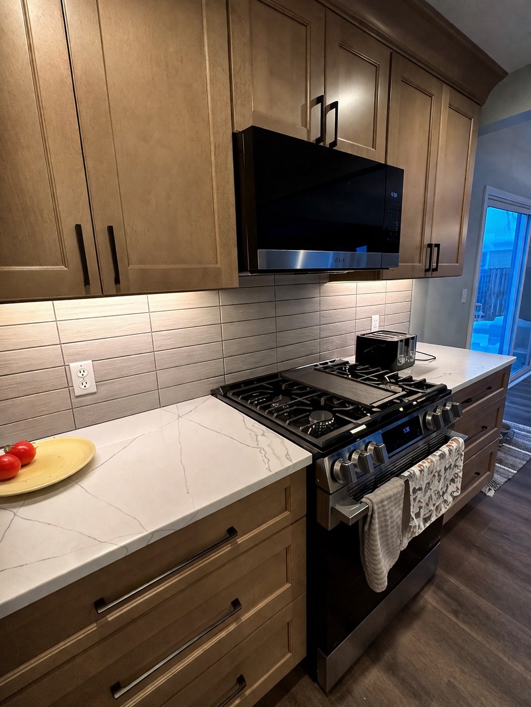 Woodland Escape bathroom — alternate angle highlighting natural wood vanity and matte black fixtures