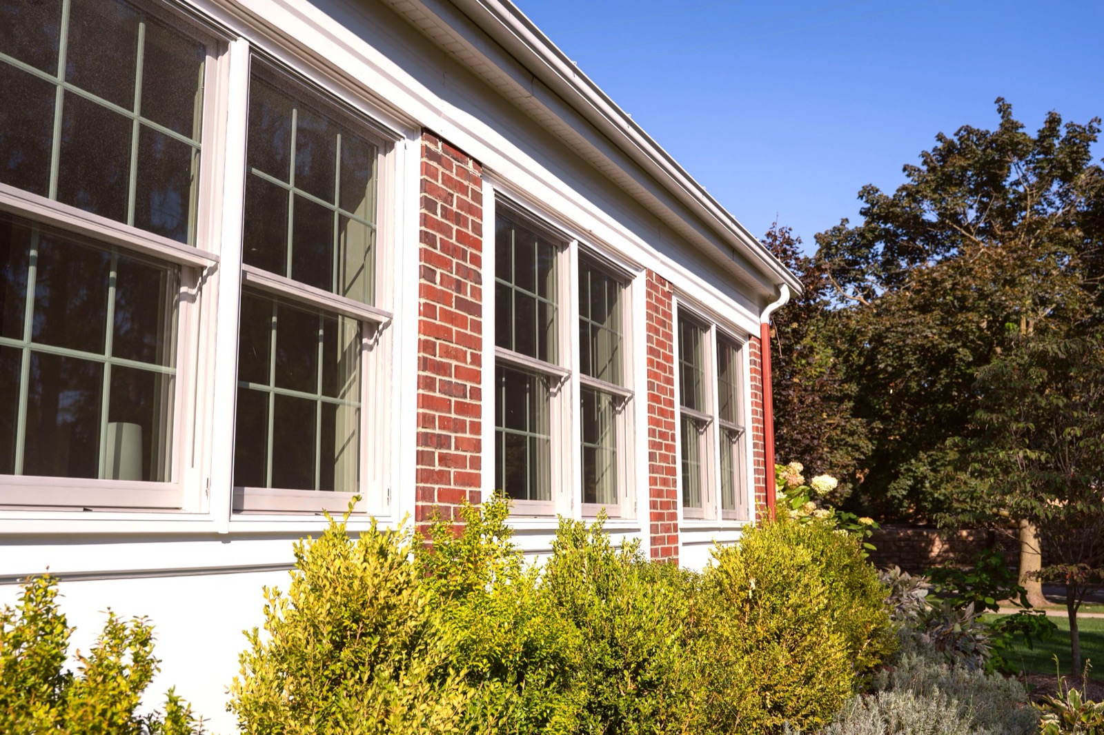 Heritage office addition detail — brick matching between original and new construction
