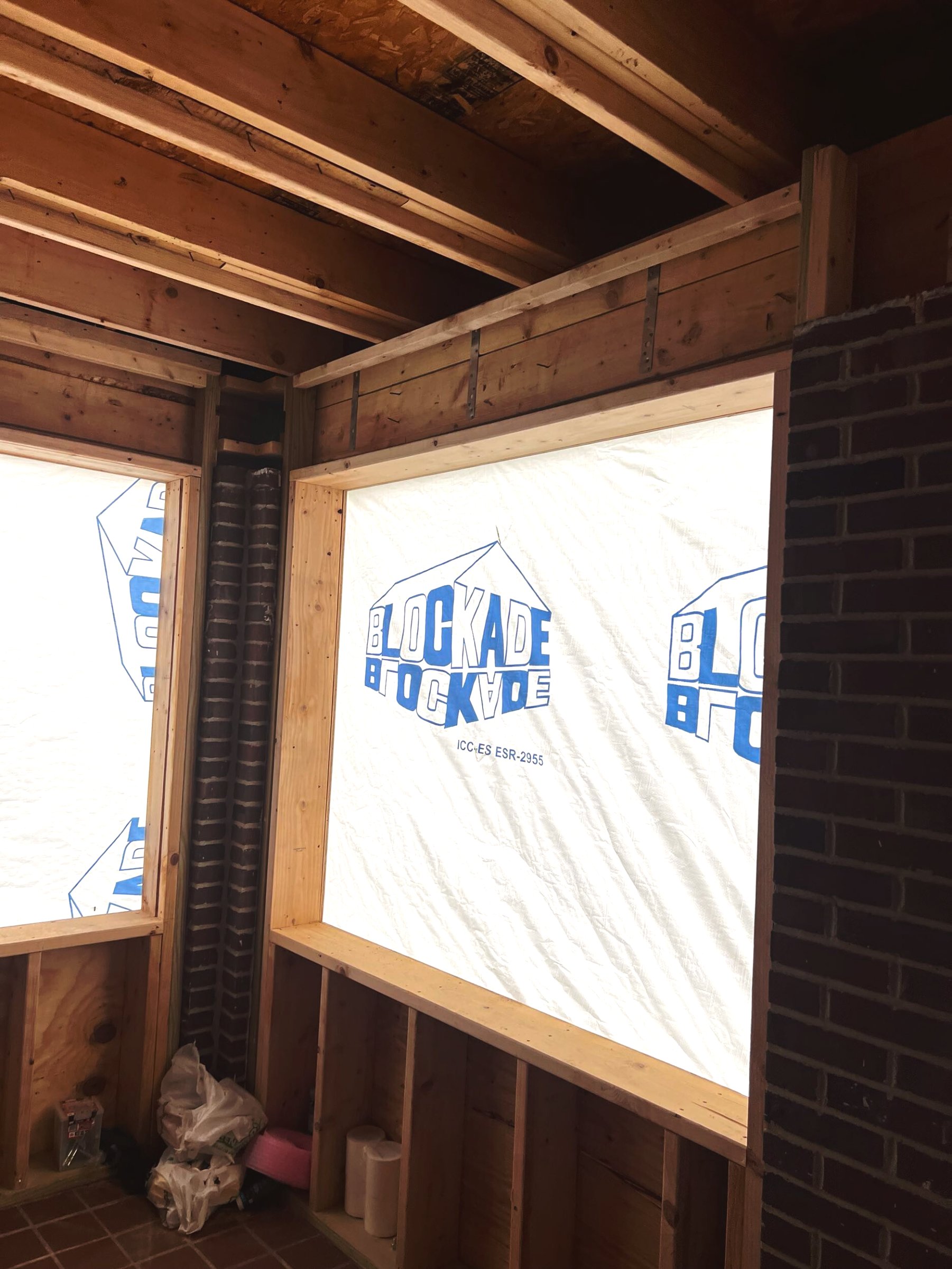 Sunroom addition — before: backyard view