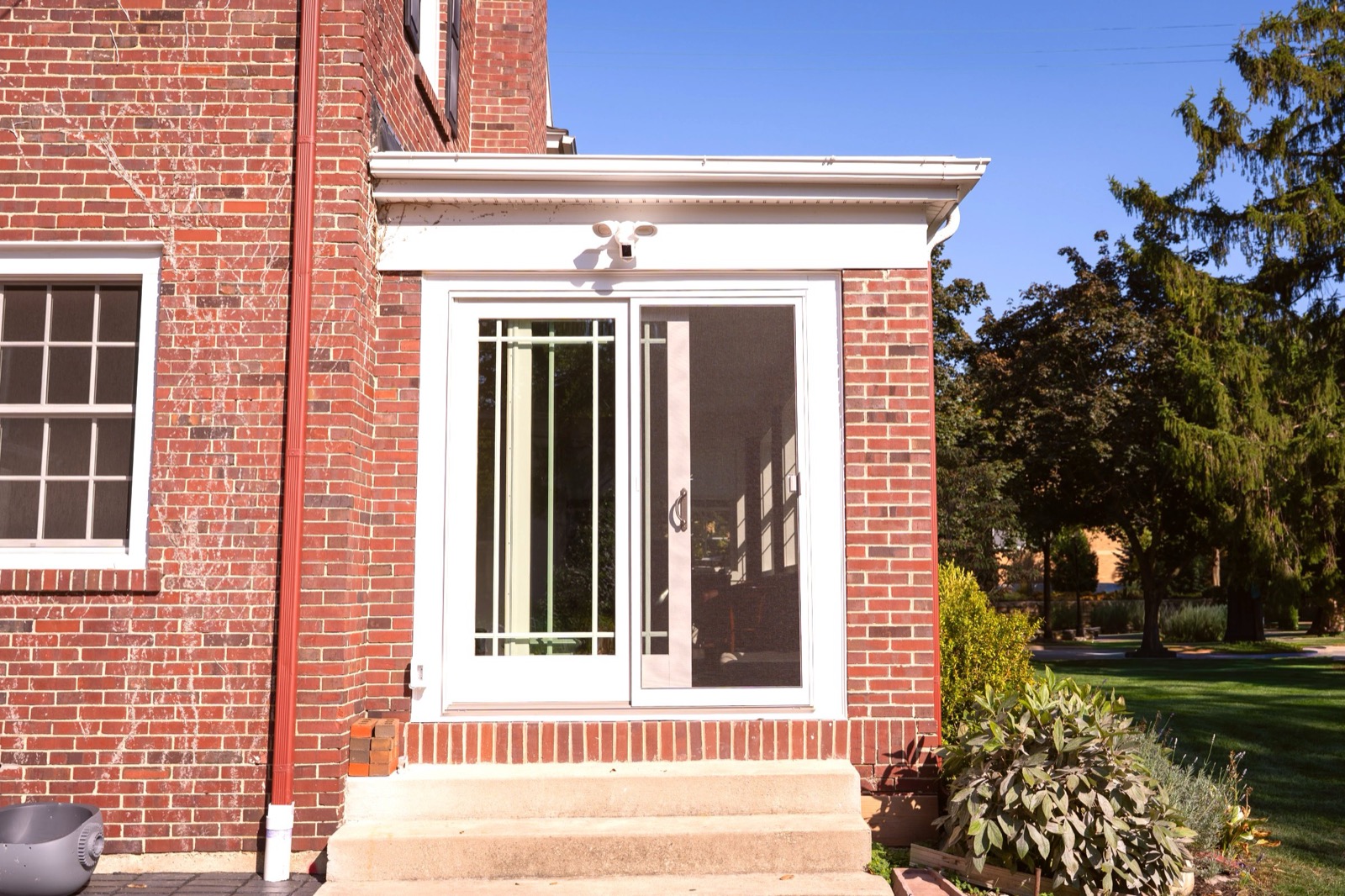 Sunroom addition detail — window framing and natural light