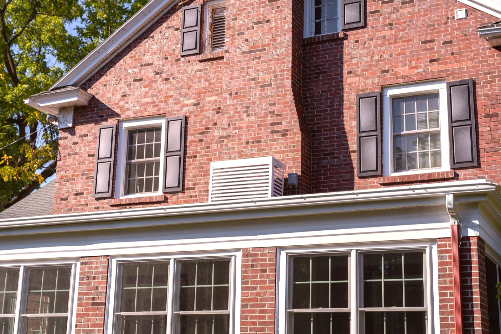 Sunroom addition detail — exterior brick matching and finishing